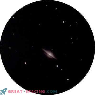 Pogled na galaksijo Sombrero iz mest